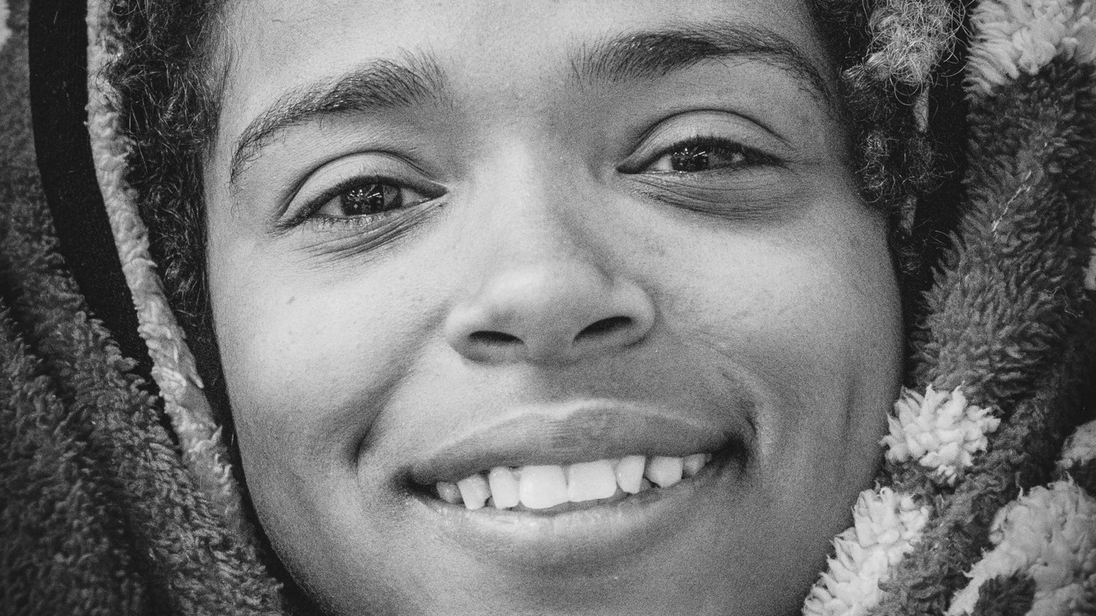 An Andre House guest, smiling at the camera