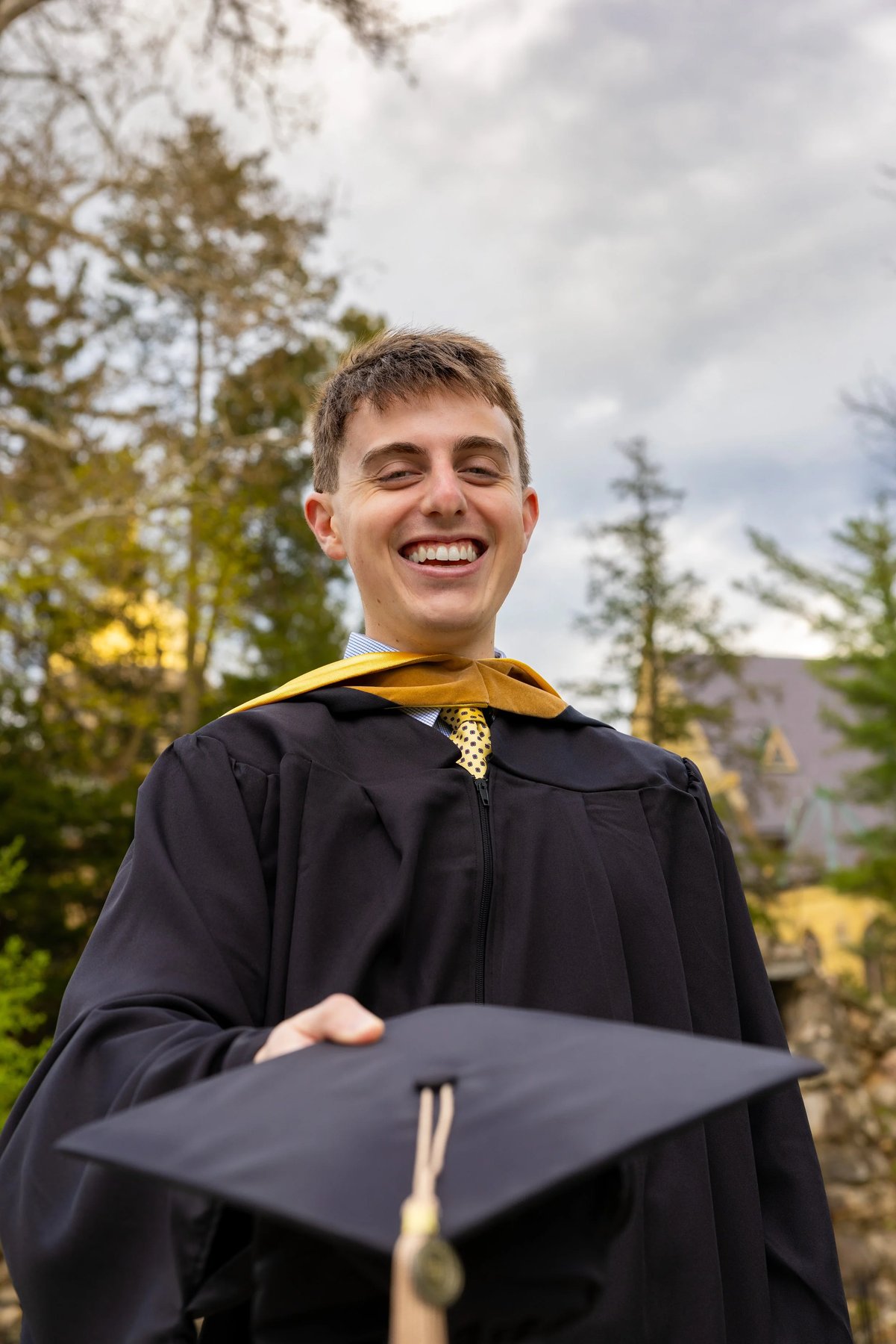 Graduate laughing