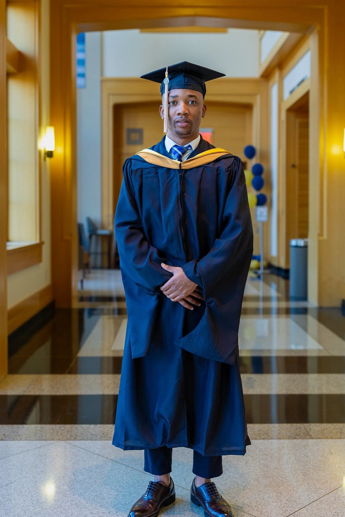 Graduate in corridor